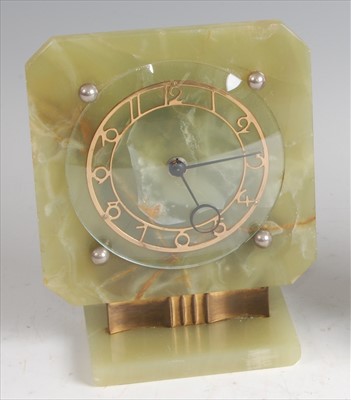 Lot 184 - An Art Deco onyx and gilt brass mantel clock,...