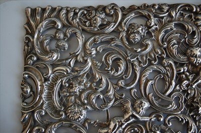 Lot 1151 - A late Victorian silver embossed panel,...