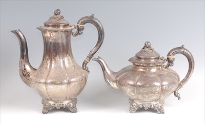 Lot 1154 - An early Victorian silver tea and coffee pot,...