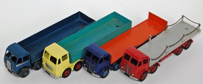 Lot 1910 - Four various play worn and loose Dinky Toy...