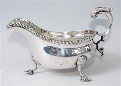 Lot 1171 - An Edwardian silver sauceboat in the mid-18th...