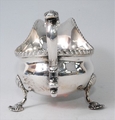 Lot 1171 - An Edwardian silver sauceboat in the mid-18th...