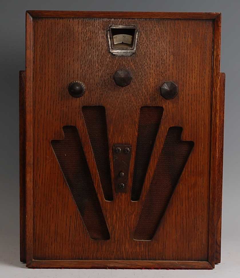 Lot 582 - A Marconi Art Deco oak cased radio
