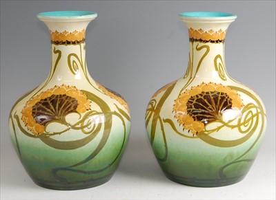 Lot 43 - A pair of large Art Nouveau pottery vases, in...