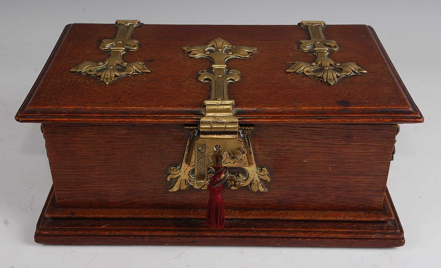 Lot 1283 - A late Victorian oak table-top casket, of...