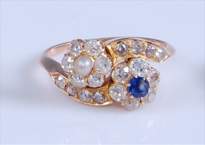 Lot 1211 - A rose and yellow metal, diamond, sapphire and...