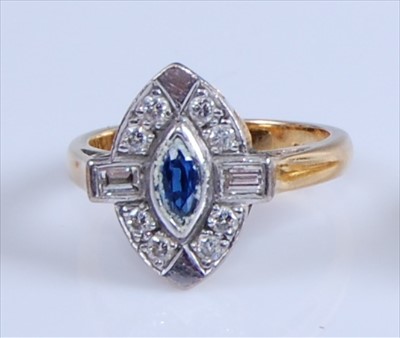 Lot 1209 - An 18ct yellow and white gold, sapphire and...