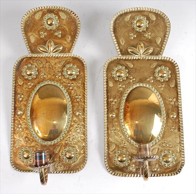 Lot 1317 - A pair of Dutch embossed brass single light...