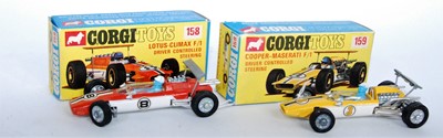 Lot 1634 - A Corgi Toys boxed F1 racing car diecast group...