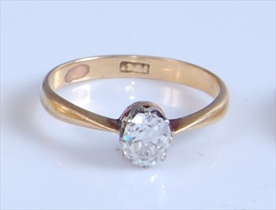 Lot 1247 - A yellow and white metal diamond solitaire...