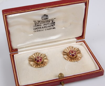 Lot 1235 - A pair of yellow metal Marguerite style...