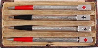 Lot 143 - Four 1930s sterling silver propelling pencils,...