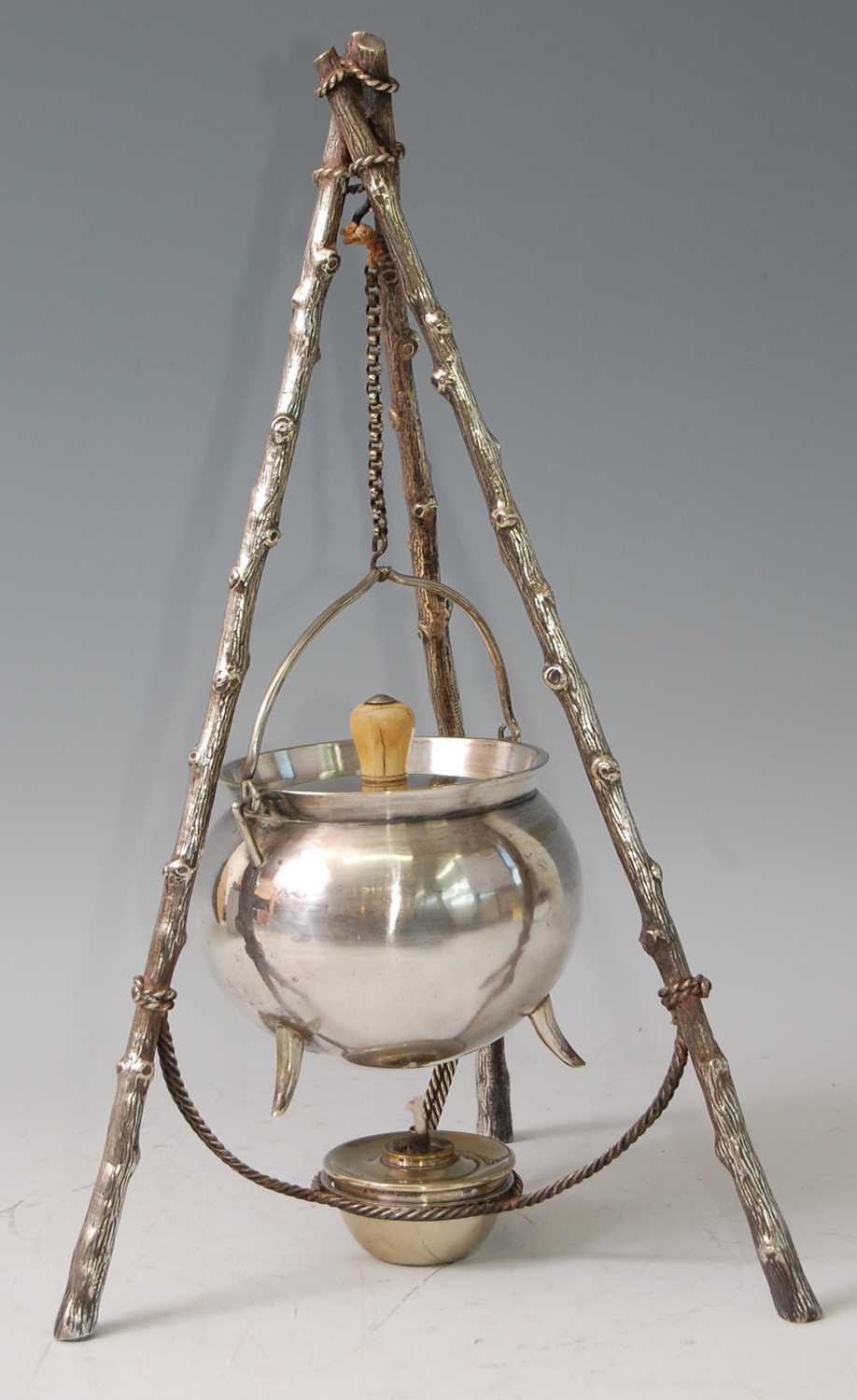 Lot 31 - An Arts & Crafts silver plated cauldron on...
