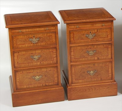 Lot 1472 - A pair of oak and burr oak three-drawer...