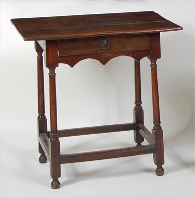 Lot 1495 - An antique joined oak side table, having a...