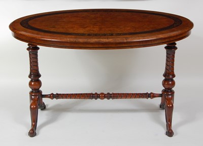 Lot 1468 - A Victorian figured walnut oval centre table,...