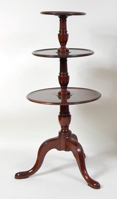 Lot 1508 - A George III mahogany three-tier dumb waiter,...