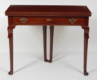 Lot 1467 - A George II mahogany tea table, having a...