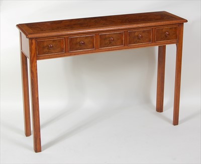 Lot 1515 - A figured walnut and crossbanded five-drawer...