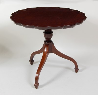 Lot 1518 - A mahogany pedestal wine table, having a...