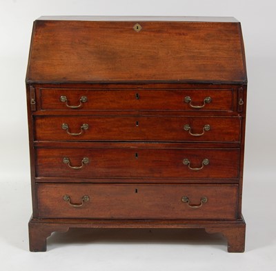 Lot 1523 - A George III mahogany writing bureau, the...