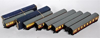 Lot 853 - Seven Hornby Dublo maroon and cream coaches:-...