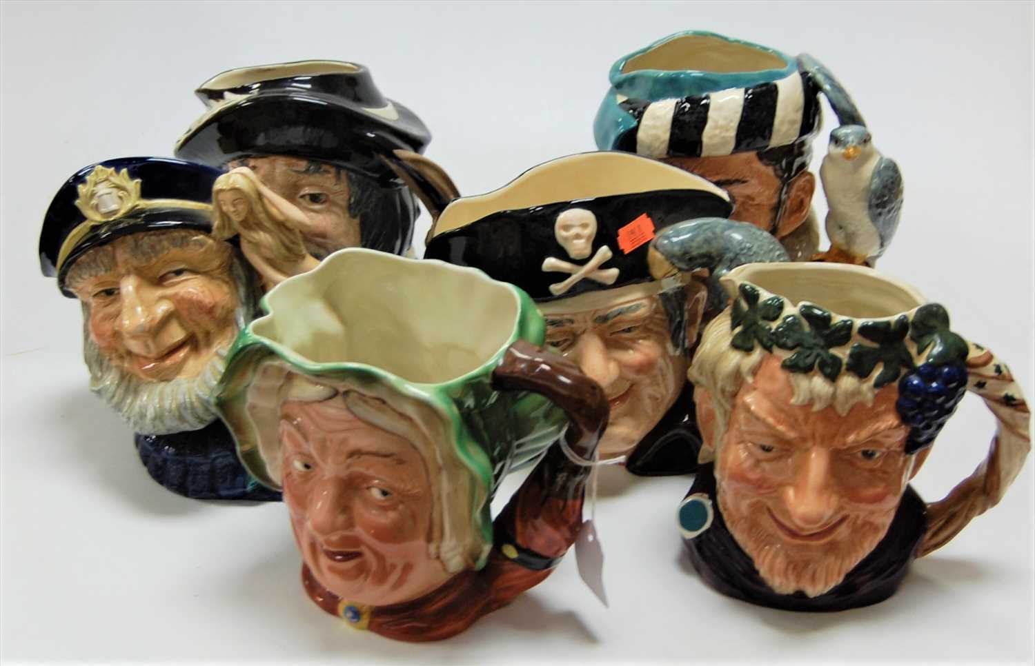Lot 17 - A collection of five Royal Doulton character...