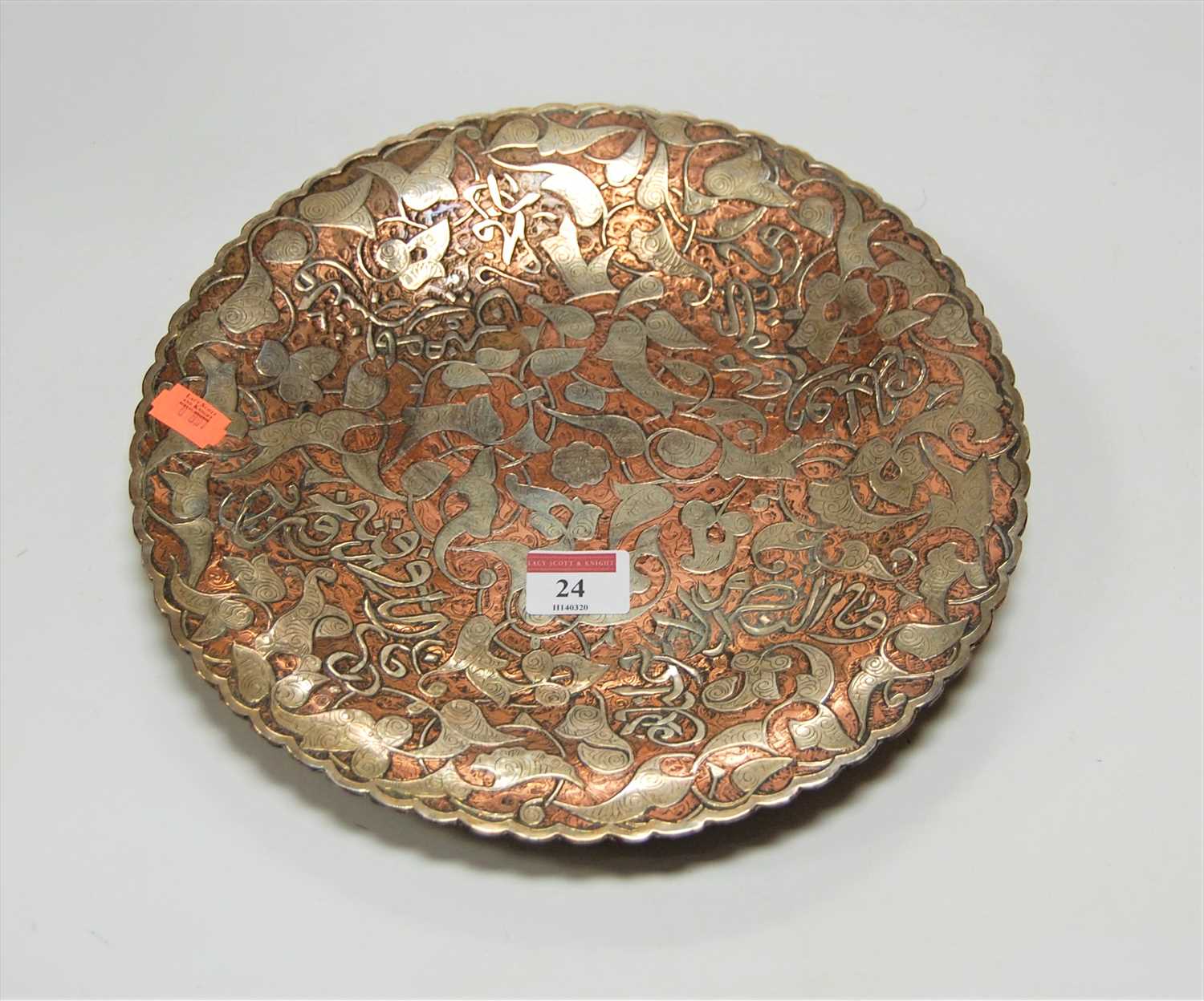 Lot 24 - An early 20th century eastern copper dish of...