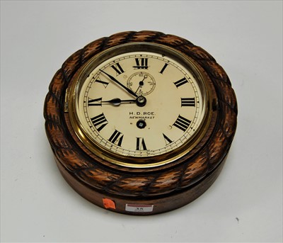 Lot 35 - An early 20th century wall clock having an...