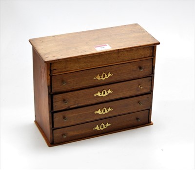 Lot 38 - A mahogany apprentice piece chest of five long...
