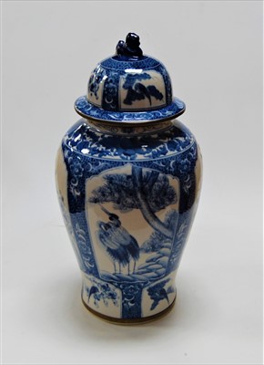 Lot 41 - A large reproduction Chinese blue & white jar...