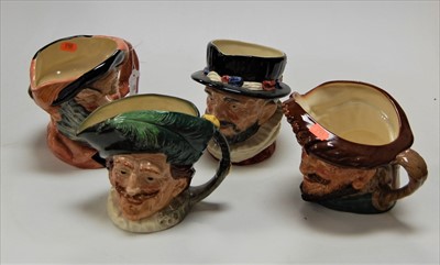 Lot 48 - A collection of four Royal Doulton character...