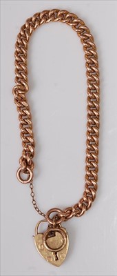 Lot 367 - A 9ct gold curblink bracelet with padlock...
