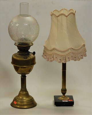 Lot 115 - An early 20th century brass pedestal oil lamp...
