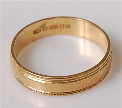 Lot 405 - An 18ct gold wedding band, 2.1g, size K