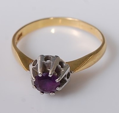 Lot 320 - A modern 18ct gold and claw set amethyst dress...
