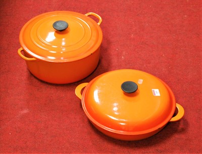 Lot 149 - A Le Creuset orange enamelled casserole dish...