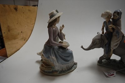 Lot 175 - A Lladro porcelain figure of two children on...