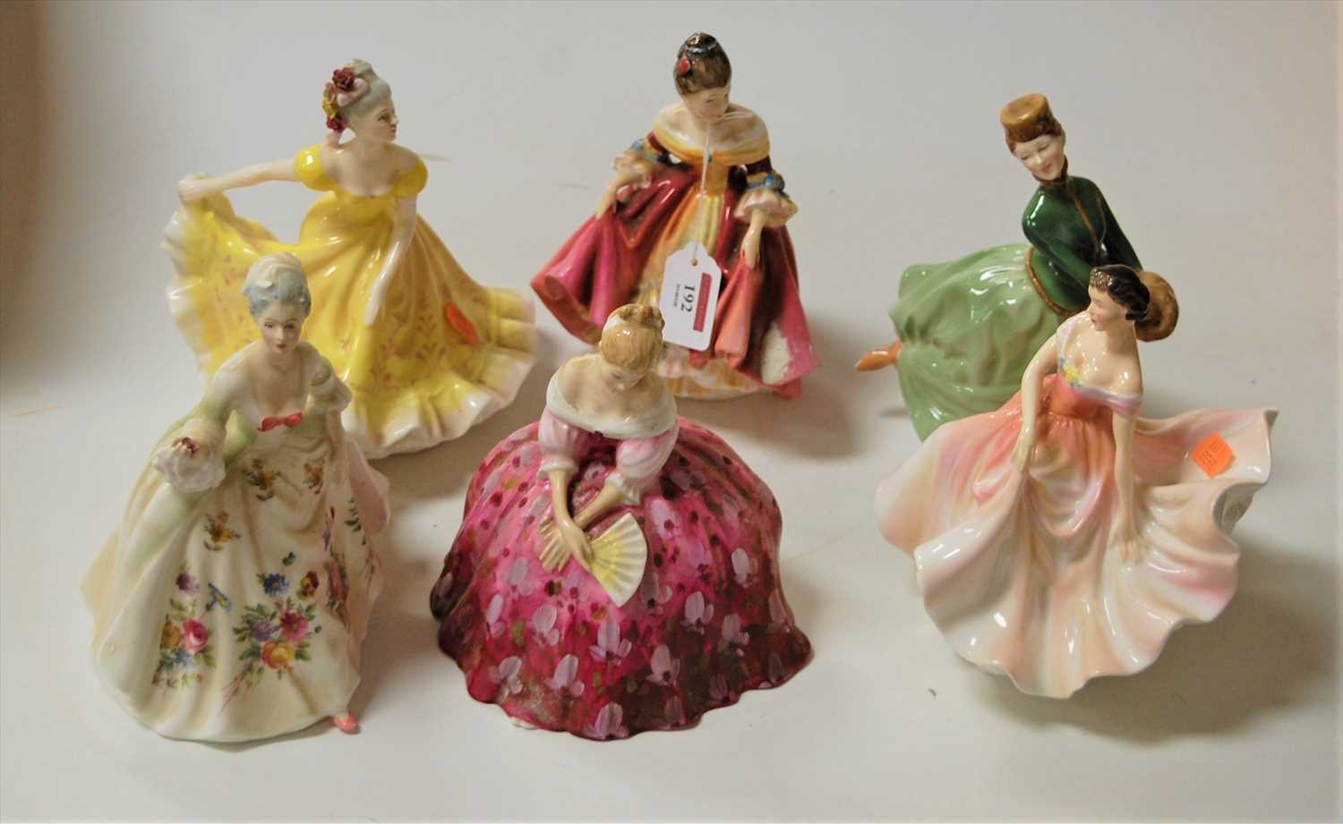 Lot 192 - Six Royal Doulton figurines, comprising...