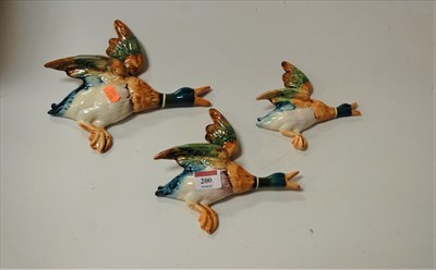 Lot 200 - A graduated set of three Beswick flying duck...