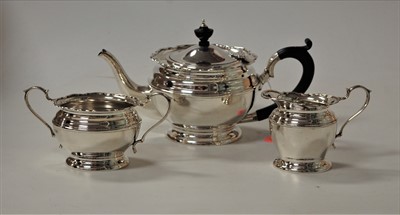 Lot 224 - A George V bachelors silver three-piece tea...