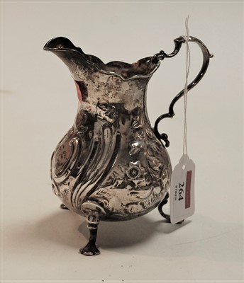 Lot 264 - A Victorian silver helmet shaped cream jug,...