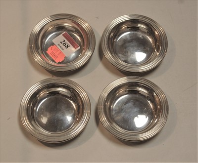 Lot 268 - A set of four sterling silver shallow bowls,...