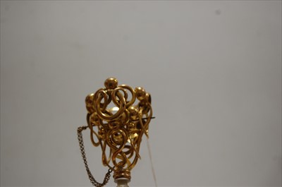 Lot 272 - A Victorian gilt metal nosegay holder, having...