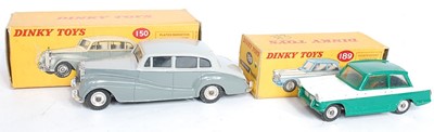 Lot 1984 - A Dinky Toys boxed saloon group, two examples...