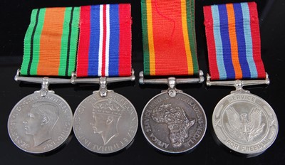 Lot 180 - A WW II Defence and War pair