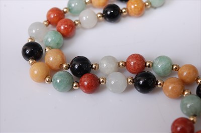 Lot 2199 - A multi-coloured jadeite bead necklace and...