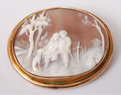 Lot 2194 - A carved shell cameo brooch in yellow metal...