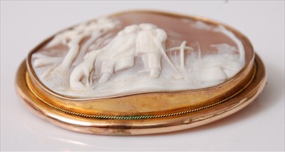 Lot 2194 - A carved shell cameo brooch in yellow metal...