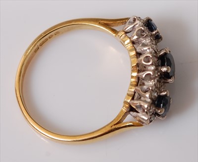 Lot 2213 - An 18ct yellow and white gold, sapphire and...